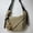 Khaki with pendant, variant on Korean Simplified New Moon Bag Fashionable Design Wheat ear Cross Body Bag Versatile High end Single Shoulder Dumpling Bag
