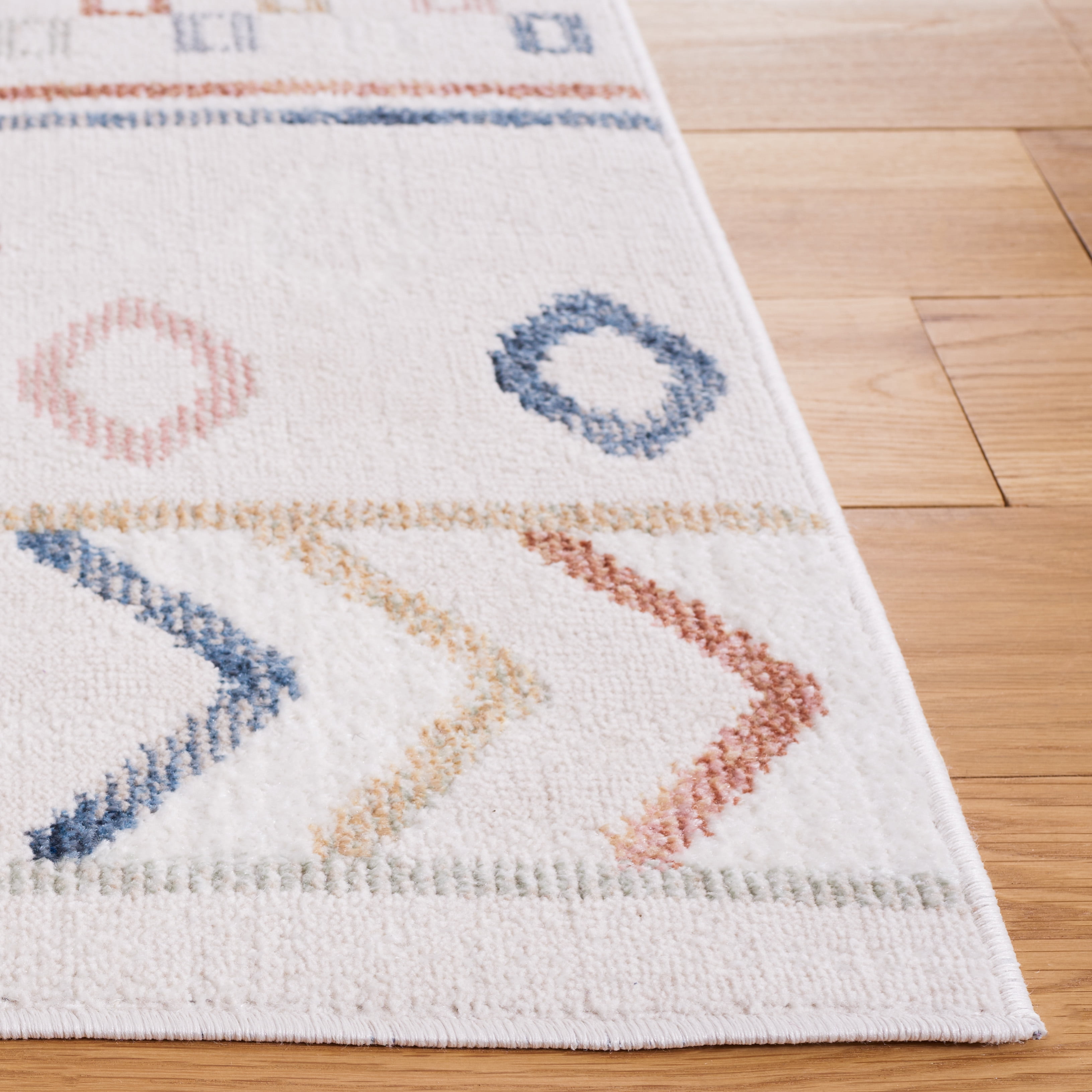 SAFAVIEH Blair Dolkar Aztec Machine Washable Area Rug, 5'3" x 7'6", Beige/Multi
