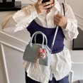thumbnail image 1 of Bolso pequeño y elegante de alta calidad para mujer, nuevo bolso de mensajero versátil de primavera 2025, bolso de bolos portátil, moderno y sencillo., 1 of 5