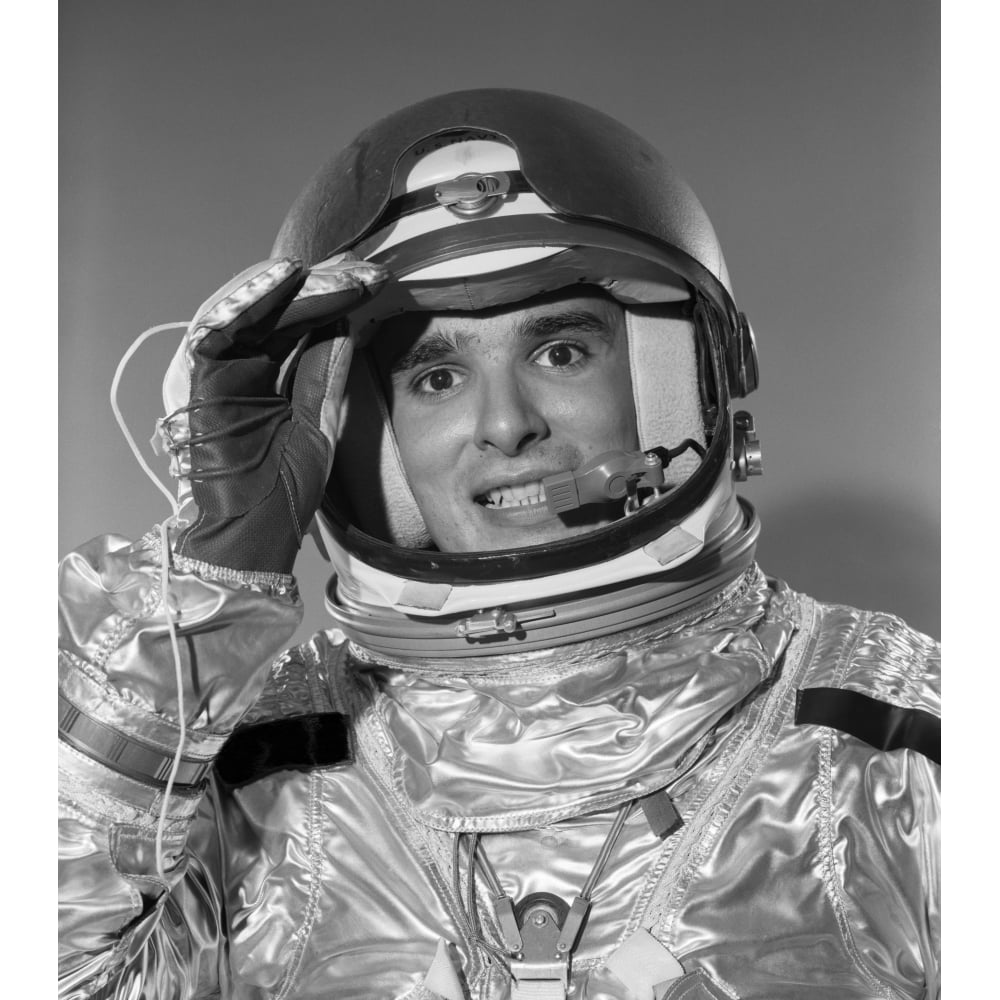 1960s Portrait Of Saluting Smiling Astronaut In Space Suit And Helmet
