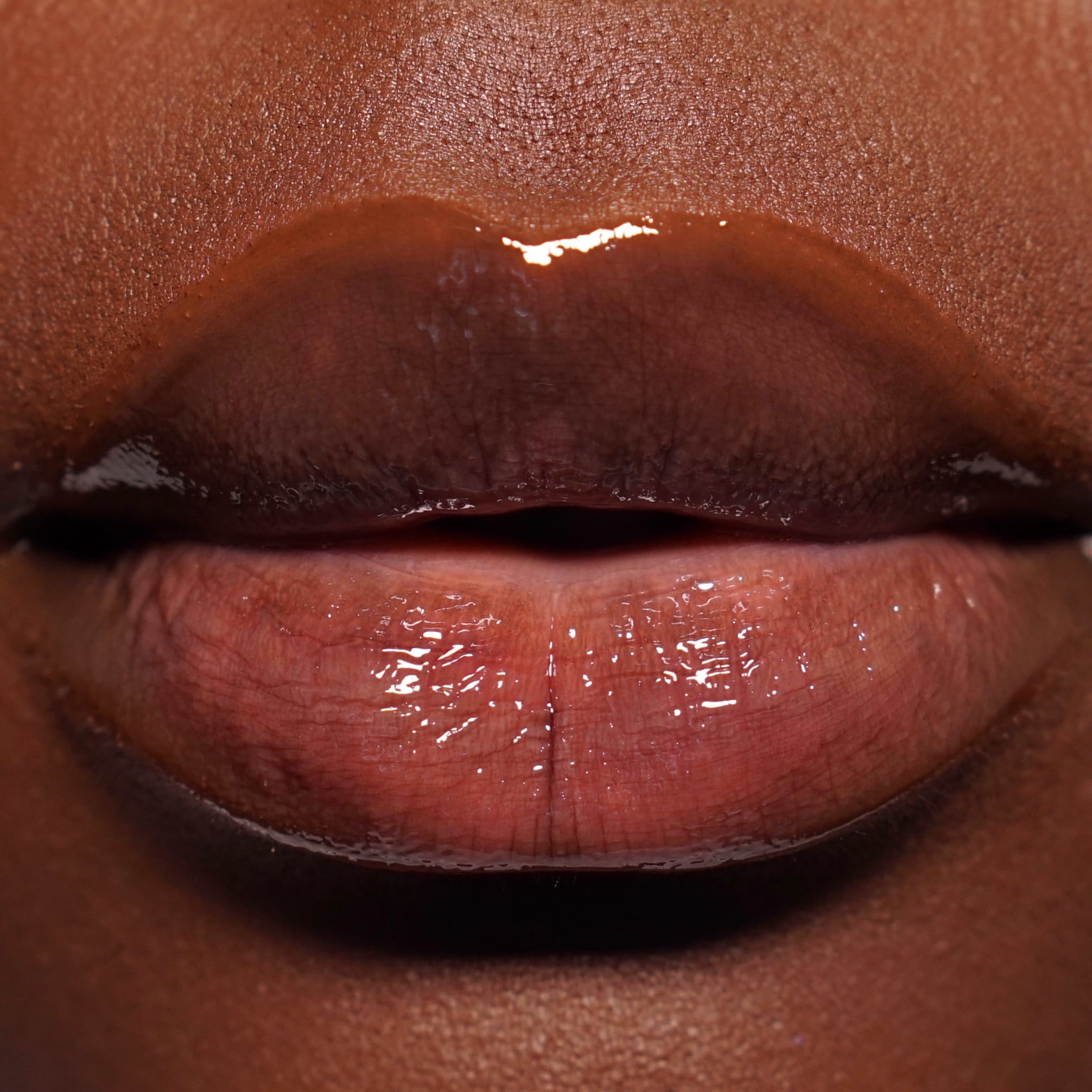 Revolution Pout High-Shine Lip Oil with Vitamin E, Midnight Black