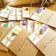 thumbnail image 3 of Tarjetas de Felicitación de flores secas hechas a mano, tarjetas de mensaje para boda, cumpleaños, Festival, fiesta, Halloween, Navidad, paquete de 10 Uds., 3 of 4