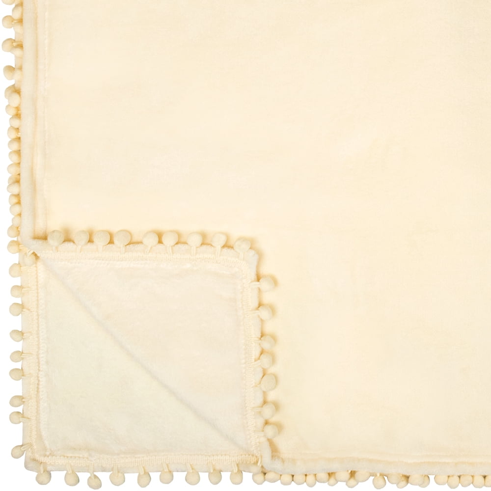 PAVILIA Fleece Throw Blanket for Couch with Pom Pom Fringe, Cream Beige, Soft Cozy Fuzzy Flannel Blanket for Sofa Bed, Lightweight Plush All Season Throw, 50x60 Inches