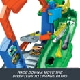 thumbnail image 6 of Hot Wheels City Ultimate T-Rex Garage with 2 Toy Cars & Storage for 50+, Race & Stunt, Dino Nemesis, 6 of 8