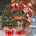 thumbnail image 3 of Globos navideños rojos lanzados Decoraciones navideñas doradas Guirnalda con globos de bastón de caramelo Caja de regalo con globos como telón de fondo para el suministro, 3 of 5