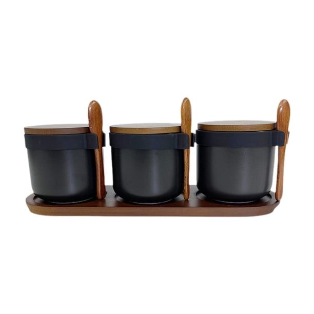 Tarros de especias de porcelana con cucharas, tarros de especias de cocina para restaurantes, azúcar y sales. negro