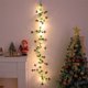 thumbnail image 1 of Guirnalda de luces decorativas navideñas de ratán de 200 cm con pilas, campanas de piña verde, hojas de árbol y frutos rojos | Luces festivas de pared para decoración navideña y fiestas en casa, 1 of 6
