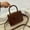 Dark brown, variant on Shangxin Texture Small Bag Women's 2020 Fashion Korean Version Net Red, Yangqi, Solid Color, Hand-Held, One-Shoulder, Cross-Body Women's Bag