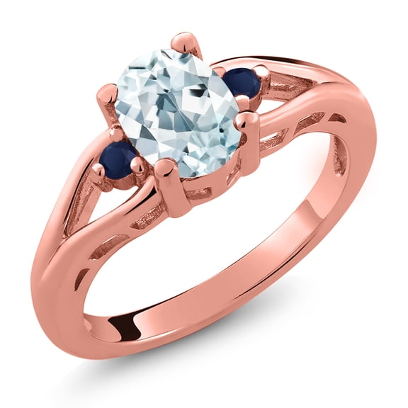 Gem Stone King 18K Rose Gold Plated Silver Sky Blue Aquamarine and Blue Sapphire 3 Stone Engagement Ring for Women | 1.29 Cttw | Oval 8X6MM | Round 2MM | Gemstone March Birthstone | Size 6