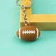 thumbnail image 4 of Llavero con colgante de fútbol. Llavero con decoraciones de fútbol., 4 of 5