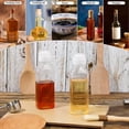 thumbnail image 4 of Paquete de 5 botellas transparentes exprimibles de 10 oz, botellas dispensadoras de condimentos de cocina for aceites, salsas, jarabes, diseño a prueba de fugas, 4 of 6