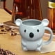 thumbnail image 1 of Taza de café de cerámica Macarena con forma de oso, 1 of 8