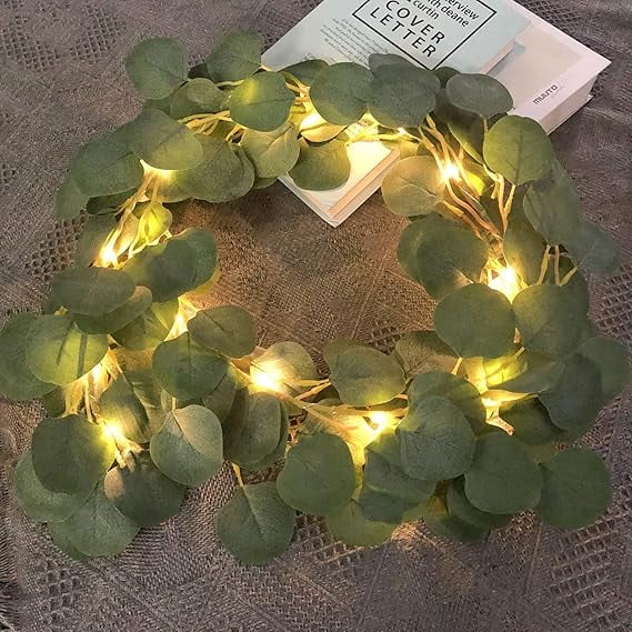 Artificial Eucalyptus Leaves Foliage String Lights 16.4Ft 50 Lights Leaf Lights Warm Greenery Vines Garland and Table Runner Battery Operated Wedding Backdrop Wall Decor