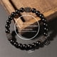 thumbnail image 4 of Pulsera de piedra de lava negro para los hombres las mujeres unisex elástico cordón ajustable pulsera de cuentas para el desgaste diario estilo casual joyería de la energía, 4 of 7