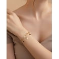 thumbnail image 3 of Pulsera de oro laminado con estrellas negras con blanco, 3 of 5