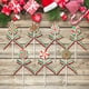 thumbnail image 3 of Palillos navideños de madera TICIAGA, 14 unidades, decoración de caramelos rojos y verdes, 3 of 5
