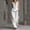 White women's boho vacation outfit a1, variant on Cagogo Women's 2 Piece Sleeveless V Neck T-Shirt Wide Leg Pants Set Casual Boho Vacation Outfit Loose Summer Travel Matching Lounge Suits Tracksuit Clothes, White XL