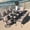 9pcs w/swivel chairs&longboard table sand, variant on Kullavik 9 Pcs Dining Sets of 8,Fence Pattern Back Chairs & Swivel Chairs,Outdoor Patio Dinging Set For Patio,Backyard,Garden,Poolside-Navy