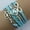 E, variant on Fashionable Retro Heart Pearl Colored Cord Layer Bracelet for Everyday Wear and Accessorizing