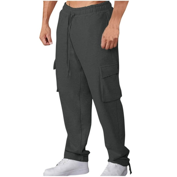Pantalones deportivos de moda para hombre, con cintura elástica y bolsillos, largos, de poliéster, de color liso.