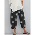 thumbnail image 1 of Pantalones holgados con bolsillos y cintura elástica con estampado de diente de león para mujer, 1 of 5