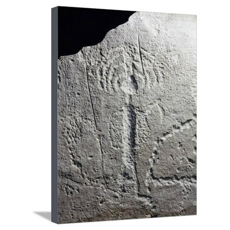 Rock engraving depicting a warrior with a feathered headdress, Plains Indian, Wyoming, USA Stretched Canvas Print Wall Art By Werner Forman