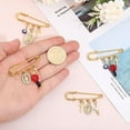 thumbnail image 3 of 4 broches de seguridad chapados en oro con colgante para mochilas, ropa e insignias., 3 of 5