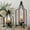 Matte Black, variant on 12.5" & 16.5" Timeless Cozy Decorative Lanterns Set of 2, Handcrafted Metal Iron Candle Holders, Farmhouse Elegance Fireplace Mantel Table Festive Gatherings Decor (Antique Gold)
