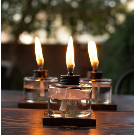 - TIKI® Brand 4-Inch Mixed Material Votive Table Torch Brown, Clear 3-pack