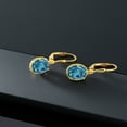 thumbnail image 4 of Gem Stone King 18K Yellow Gold Plated Silver London Blue Topaz Leverback Dangle Earrings for Women (3.60 Cttw, Gemstone November Birthstone, Oval 9X7MM), 4 of 5