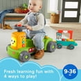thumbnail image 2 of Fisher-Price Juguete para bebés y niños pequeños Ríe y aprende Tractor 4 en 1 de la granja al mercado para montar con carrito de tracción y escenarios inteligentes para bebés a partir de 9 meses, 2 of 5