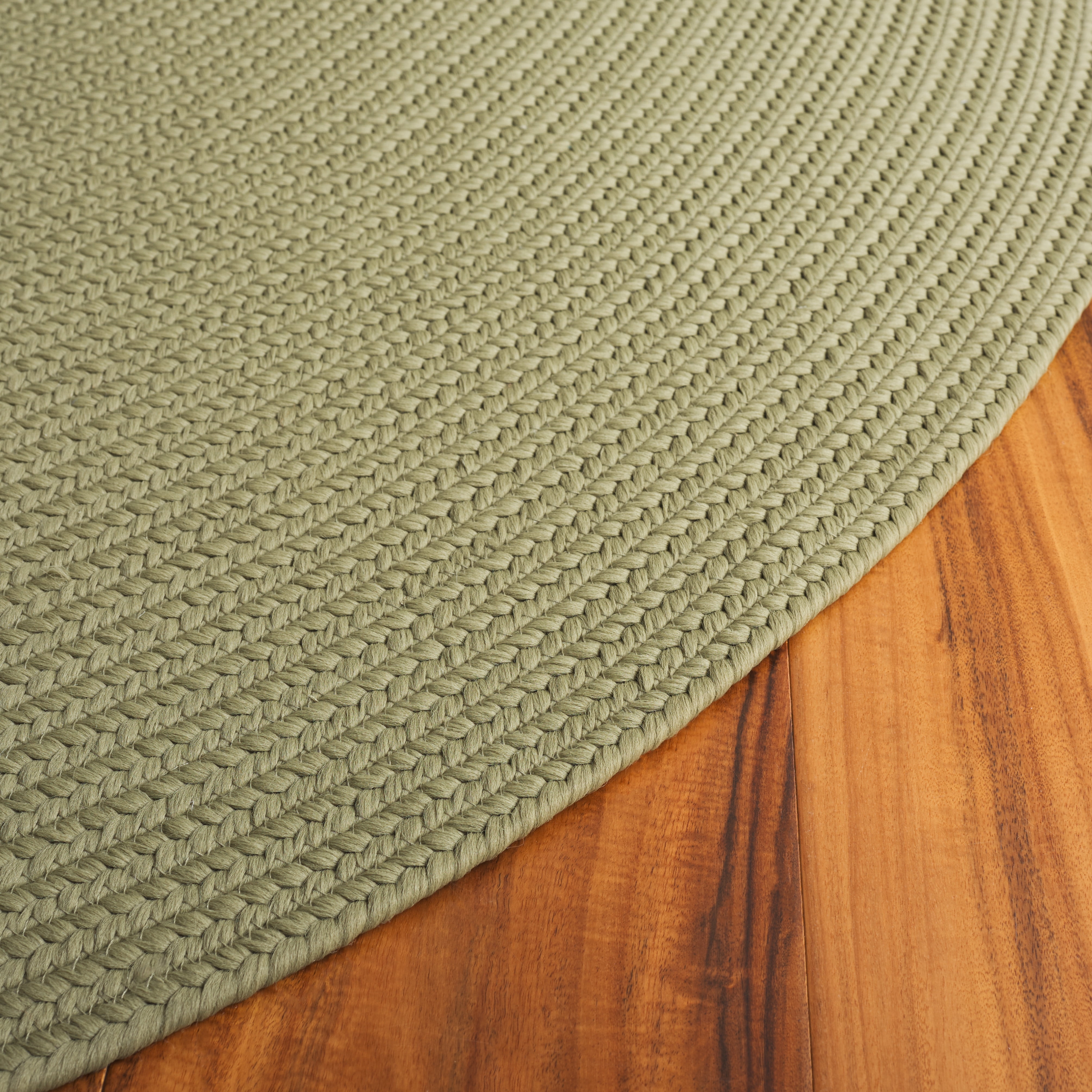 SAFAVIEH Braided Rishika Solid Machine Washable Reversible Area Rug, Sage, 6' x 9' Oval