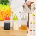 thumbnail image 4 of 4-pcs Mini Kitchen Sauce Bottles, Squeeze Bottles Condiment Dispenser for Ketchup Mustard and Salad, 3.14x1.26inch Portable Lunch Box Condiment Bottles with Leakproof Screw Cap D0C7, 4 of 8