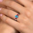 thumbnail image 4 of Gem Stone King 925 Silver and 10K Yellow Gold Swiss Blue Topaz and Red Created Ruby Engagement Ring for Women | 2.00 Cttw | Oval 8X6MM | Gemstone November Birthstone | Size 9, 4 of 6
