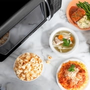 Nostalgia 0.7 cu ft Retro Microwave Oven, 700W Countertop Microwave Oven with 8 Auto Cook Programs, Black