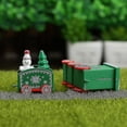 thumbnail image 2 of Adorno de mini tren navideño Tren de cuatro secciones Decoración navideña pintada Juguetes de regalo debajo de las decoraciones para árboles de Navidad (verde) (1 unidad), 2 of 4