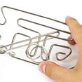 thumbnail image 4 of Puzzle Einstein's Fish de metal y madera de Professor PUZZLE, 4 of 8