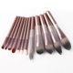 thumbnail image 5 of Juego de 12 brochas de maquillaje profesional con diseño de uva, asas de madera duradera y funda PU, ideal para un maquillaje preciso y cómodo., 5 of 6