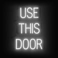 thumbnail image 1 of SpellBrite USE THIS DOOR LED Sign for Business. 17.4" x 23.8" White USE THIS DOOR Sign Has Neon Sign Look With Energy Efficient LED Light Source. Visible from 500+ Feet, 8 Animation Settings., 1 of 4