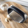thumbnail image 2 of Stainless Steel Rocking Garlic Press, Black and Silver, 2 of 5