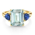thumbnail image 2 of Gem Stone King 18K Yellow Gold Plated Silver Simulated Aquamarine and Blue Created Sapphire 3 Stone Ring for Women (6.49 Cttw, Octagon 12X10MM, Trillion 5X5MM, Gemstone March Birthstone, Size 7), 2 of 3