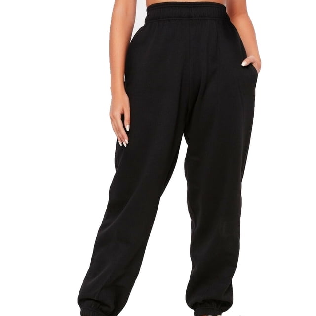 POINTERTECK Women Casual Sweatpants Drawstring Dance Harem Long Pants Sports Baggy Trousers in solid black color. Made of cotton and polyester for a smooth, breathable, and comfortable fit. Features a loose, baggy design with elastic cuffs and a drawstring waistband, ideal for casual wear, parties, holidays, or daily activities. Perfect as women's joggers with a street style vibe. Available in multiple sizes: S, M, L, XL.