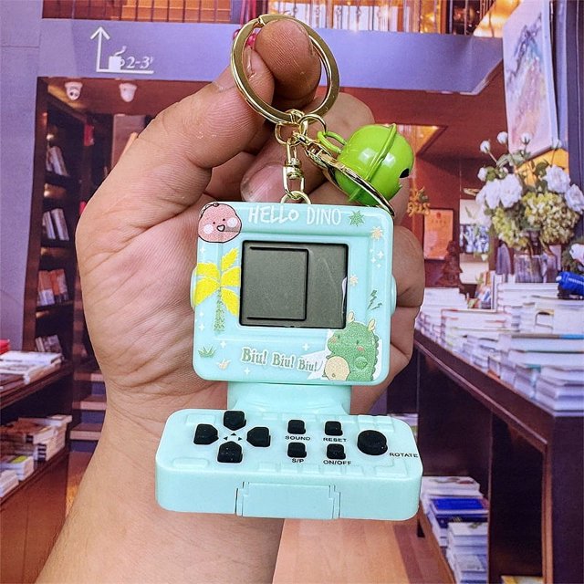 Mini computadora portátil creativa, máquina de juegos electrónica pequeña, llavero, bolso de moda exquisito, colgante pequeño informal