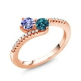 thumbnail image 2 of Gem Stone King 18K Rose Gold Plated Silver Blue Tanzanite and London Blue Topaz Bypass Ring for Women (0.87 Cttw, Gemstone December Birthstone, Round 4MM, Size 9), 2 of 4