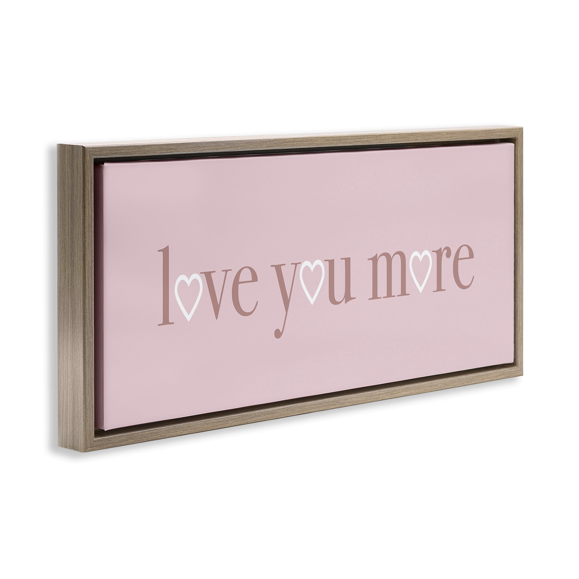 Stupell Industries Soft Pink Love You More Phrase Typography Painting Brown Floater Framed Canvas Art Print Wall Art, 25 x 11