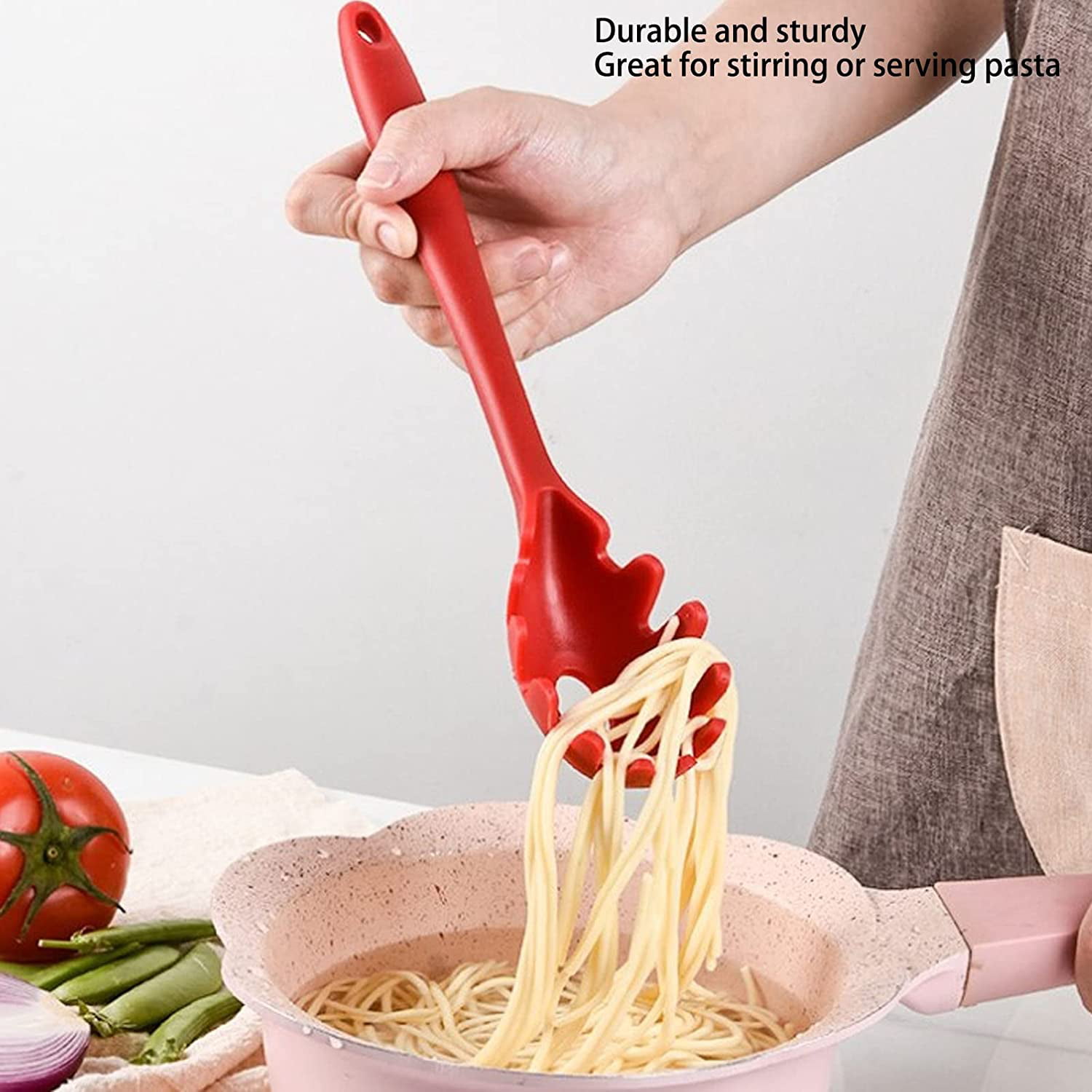 3-in-1 Shark Kitchen Tool is a spaghetti measure, silicone mitt, spoon rest