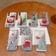 thumbnail image 2 of Funda Navideña Xihbxyly para Teléfono con 16 Bonitos Diseños Ondulados y Rizados Diseño de Muñeco de Papá Noel, 2 of 2
