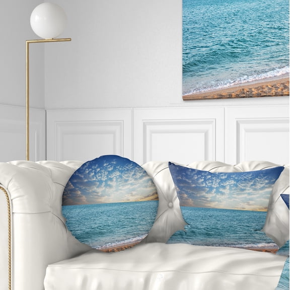Designart Fasting Moving Clouds Over Blue Beach - Modern Beach Throw Pillow - 12x20