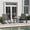 Black, variant on Merrick Lane Brevyn 3 Piece Outdoor Bistro Set with Flex Comfort Rocking Chairs and Steel Framed Glass Top Table, Black/Black