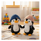 thumbnail image 2 of 2Pingüinos Negro Blanco Peluche Gorro Malubero, Rosa/Azul, 2 of 5